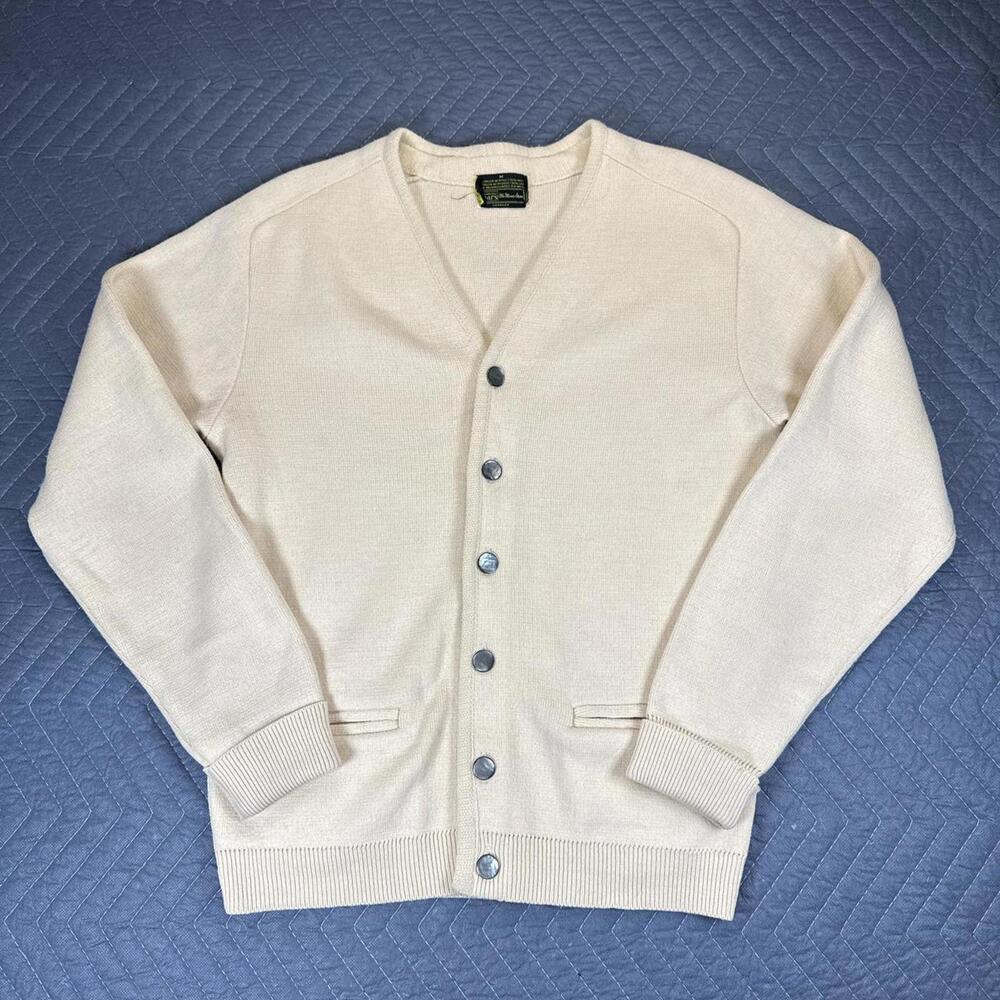 Vintage Sears knit cardigan in a soft cream tone.